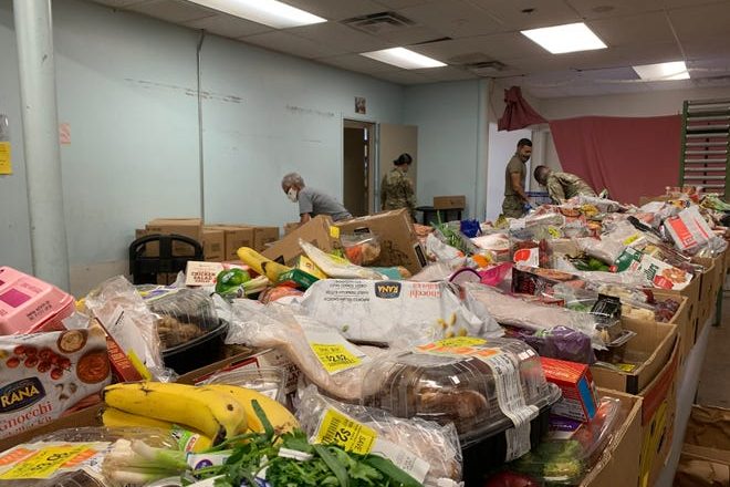 row of food boxes in a storage room