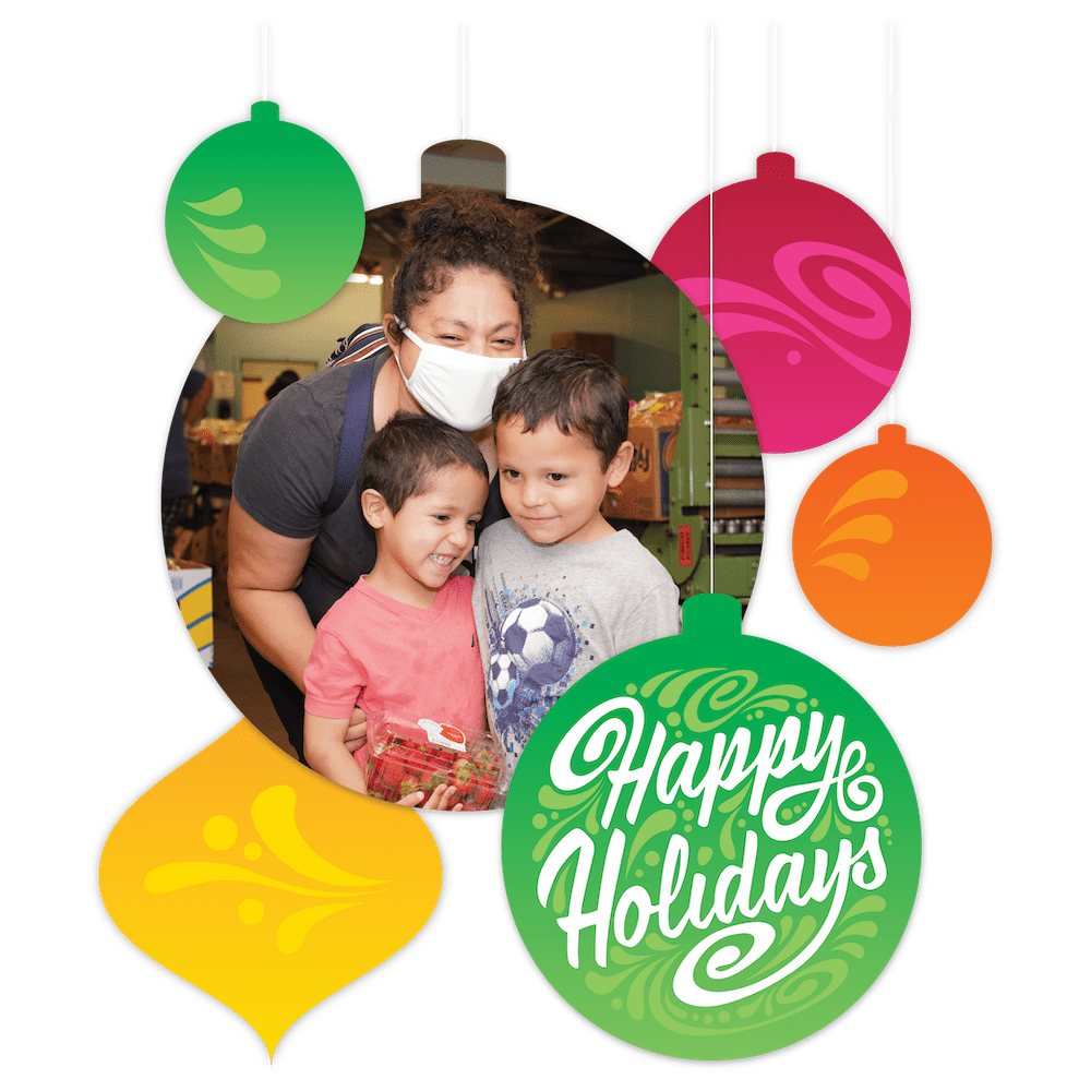 Picture of mother and kids being helped at food bank. Image contains Happy Holidays text with ornaments surrounding image of family.